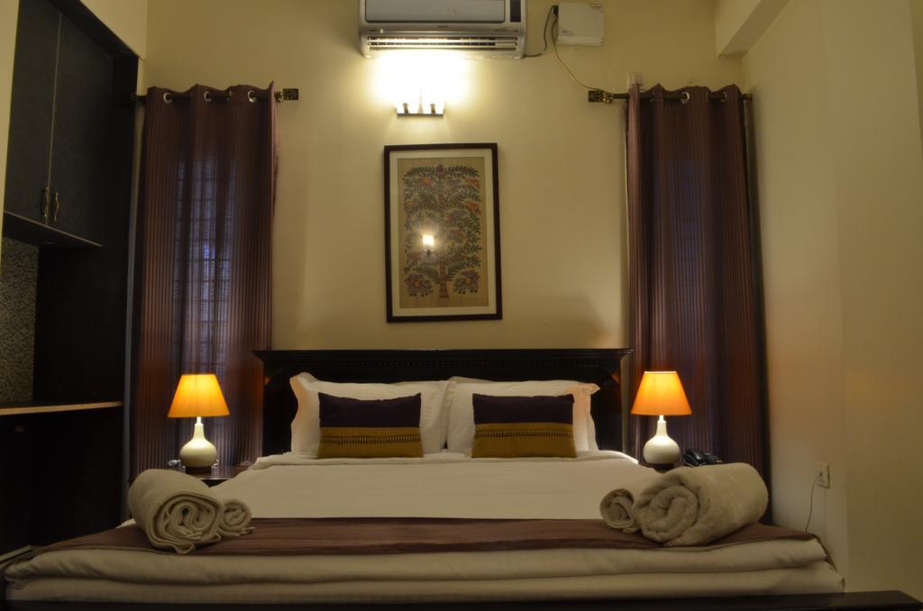 Luxtay Suites Bangalore Quarto foto