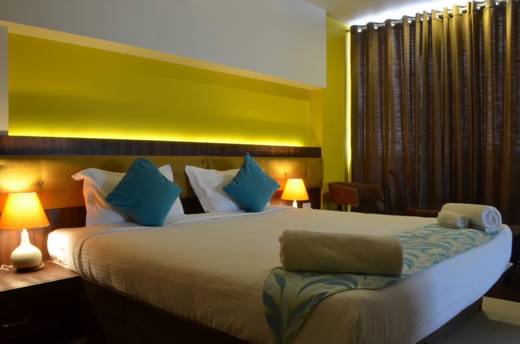 Luxtay Suites Bangalore Quarto foto