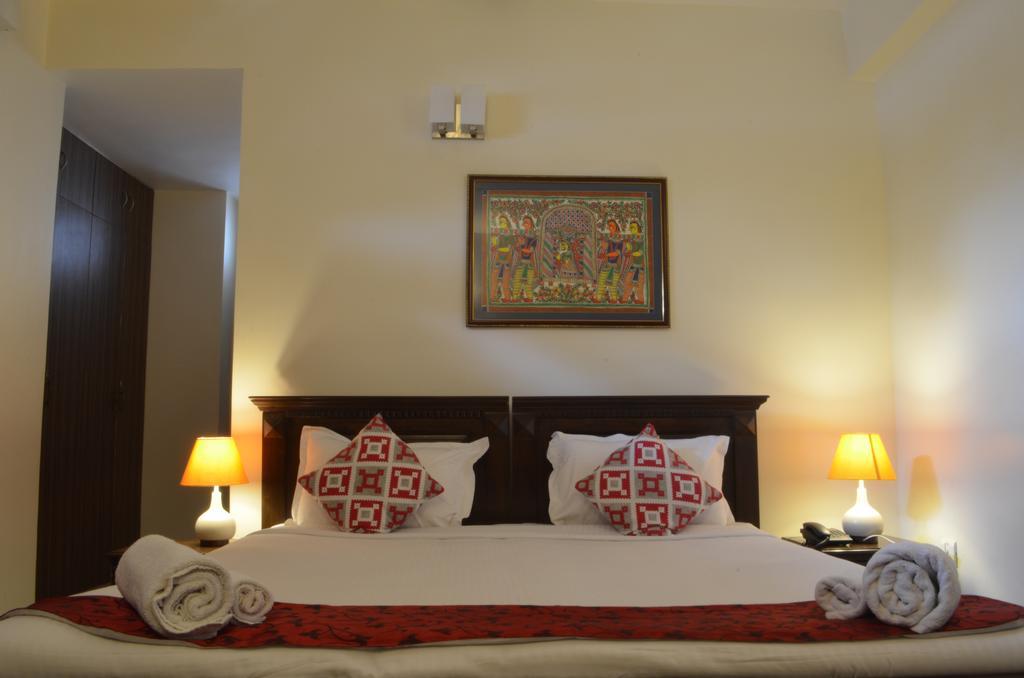 Luxtay Suites Bangalore Quarto foto